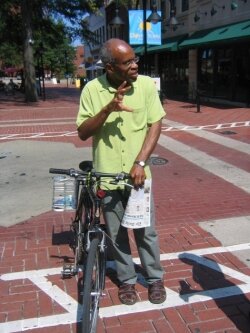 His own commuting habits, seen here in 2005, helped spur bike lanes.
