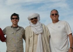 Webster (right) with Esmont-based musician Peter Griesar and a Tuareg friend during a 2006 desert race.